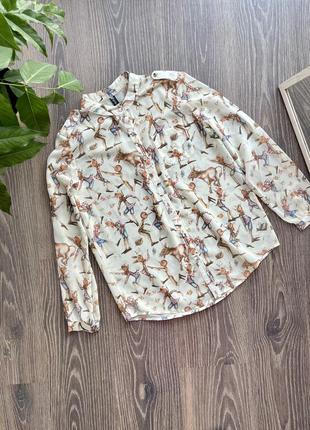 Розпродаж блуза жіноча легенька в принт з регульованим рукавом