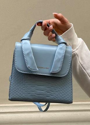 Женская сумка кросс-боди на регулируемом ремешке в стиле рептилия на одно отделение, голубая6 фото