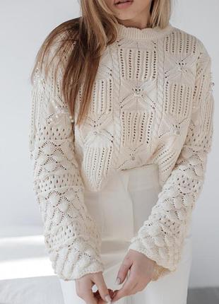 В'язана кофтинка з бусинами та камінчиками