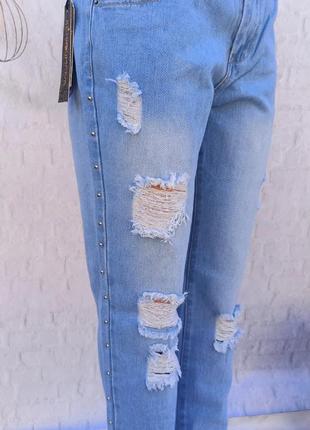 Женские рваные джинсы на размер 26-274 фото