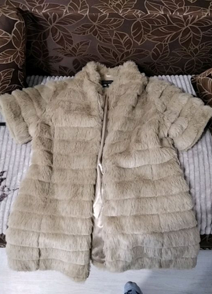 Хутряна жилетка