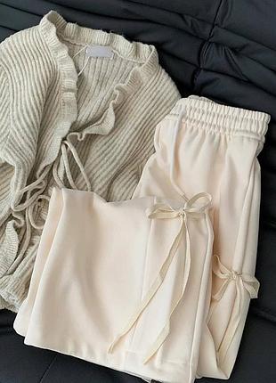 Широкие спортивные штаны с бантиками