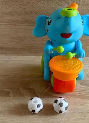 Детский музыкальный слоник-жонглер 664b с барабаном и левитационным мячиком, синий игрушка для ребенка2 фото