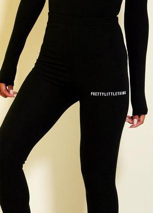 Черные женские лосины леггинсы в рубчик с разрезами с лого plt4 фото