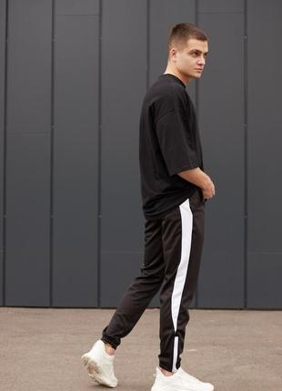 Черно белые спортивные штаны мужские с лампасами2 фото