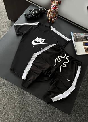 Комплект футболка и брюки nike цвет: черный с белыми лампасами