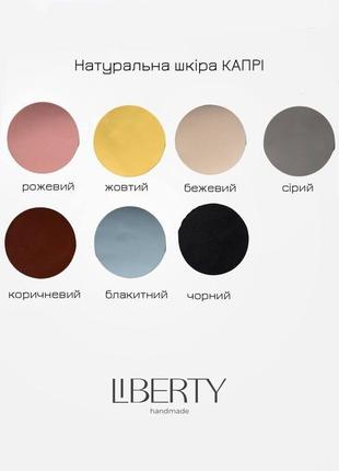 Трикутна стильна жіноча сумка з вінтажній натуральної шкіри8 фото