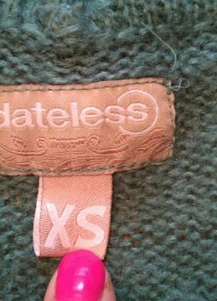 Зелений светр