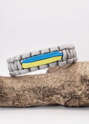 Паракордовий браслет cobra з жовто-блакитною стрічкою на пластиковій застібці, розмір і колір під замовлення4 фото