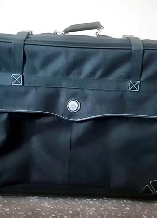 Велика зелена валіза на колесах 76 х 56 см