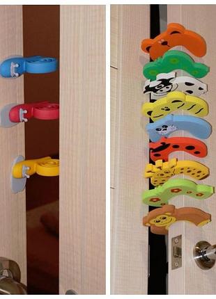 Стопори, блокатори, фіксатори дверей для безпеки дітей