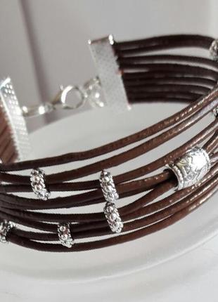 Браслет кожаный в 9 шнуров "коричневый"