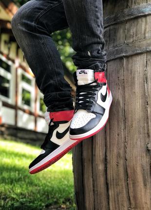 Прекрасные мужские кроссовки nike air jordan 1 retro белые с красным и чёрным8 фото