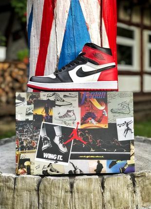 Прекрасные мужские кроссовки nike air jordan 1 retro белые с красным и чёрным5 фото