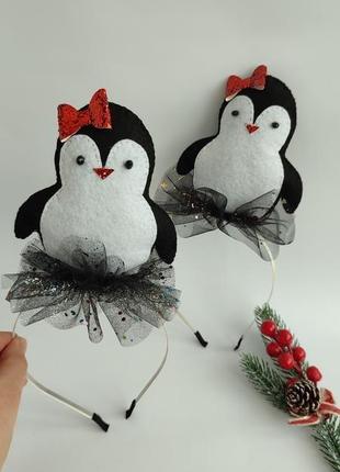 Обруч пінгвіна, пінгвін на обручі, до образу пінгвіна.