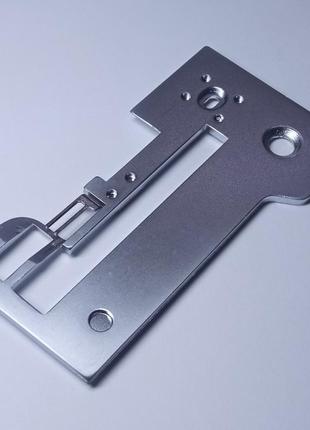 Голова пластина на оверлок brother 1034