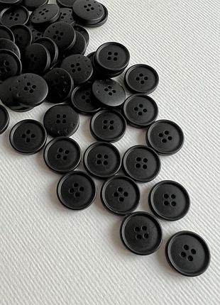 Ґудзик сорочковий бортик матовий 4отв чорний 15мм мушля