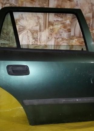 Дверь задняя правая opel astra g
