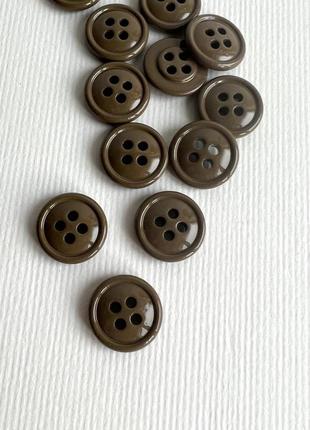 Ґудзик сорочковий тоненький бортик 4отв коричневий 15мм пластик