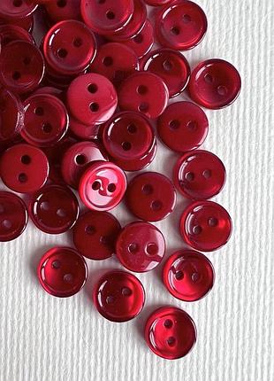 Пуговица рубашечная бортик перламутр 2отв красная 10мм пластик