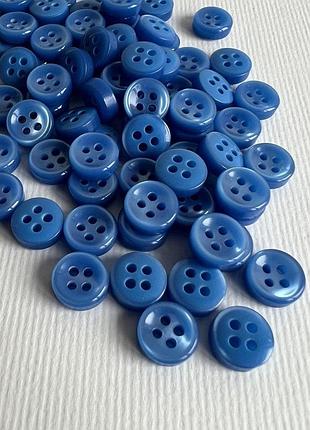 Пуговица рубашечная глянцевая светлая 4отв синяя 10мм пластик