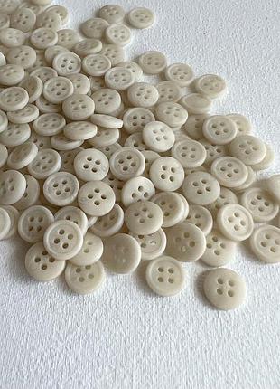 Ґудзик 7/648 сорочковий бортик 4отв бежевий 12мм пластик