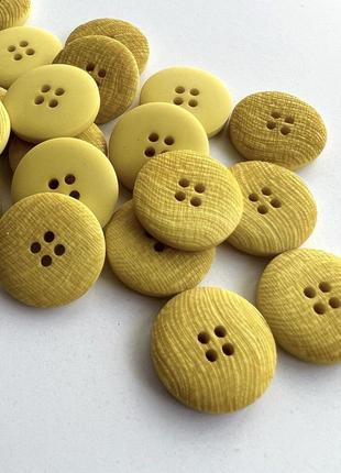 Ґудзик костюмний твід 4отв жовтий 18мм пластик
