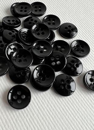 Ґудзик сорочковий бортик глянцевий 4отв чорний 11мм пластик