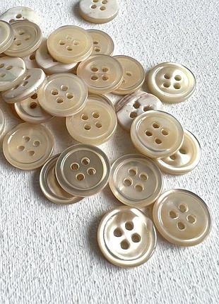 Пуговица рубашечна бортик 4отв бежевая 12мм ракуш