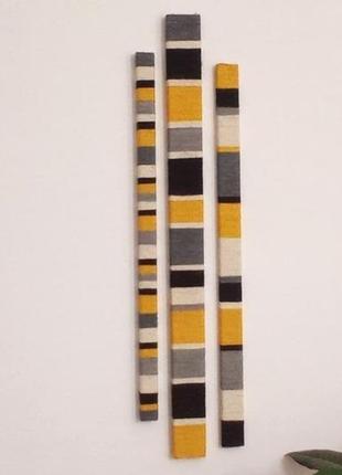 Панно на стену оригинальной формы в желто-серо-черных тонах3 фото