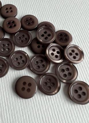 Ґудзик сорочковий бортик глянцевий перламутровий 4отв коричневий 11мм пластик