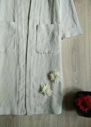 Новый свет бежевый кардиган накидка с разрезами по бокам разрызги