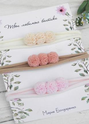 Пов'язка з фатиновыми помпонами для малятка
