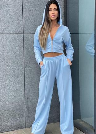 Стильный трикотажный спортивный костюм двойка с широкими брюками палаццо с кофтой на молнии с капишоном