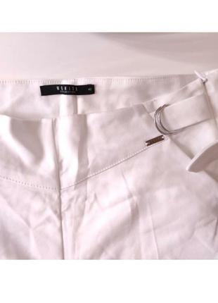 Білі фірмові брюки2 фото