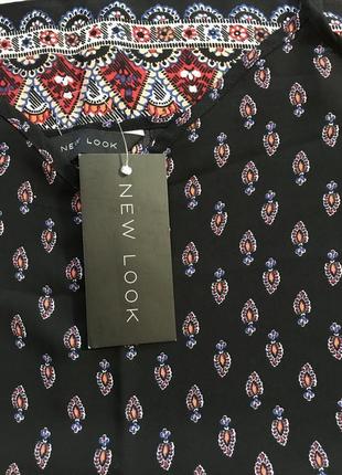 Очень красивая и стильная брендовая блузка-майечка.1 фото