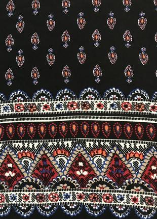 Очень красивая и стильная брендовая блузка-майечка.5 фото