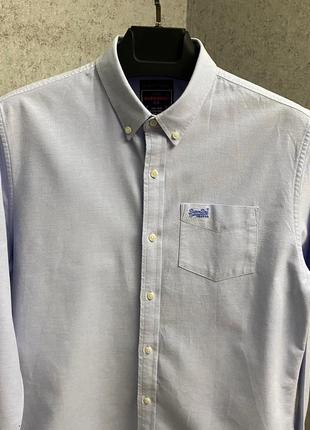 Голубая рубашка от бренда superdry3 фото