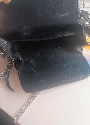Сумочка черного цвета с металлическими элементами на палочку сумка на кирпичике7 фото