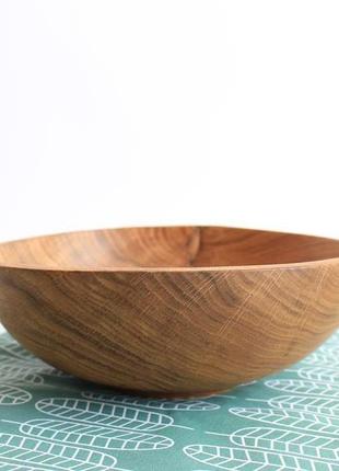 Стильная деревянная тарелка (1351)9 фото