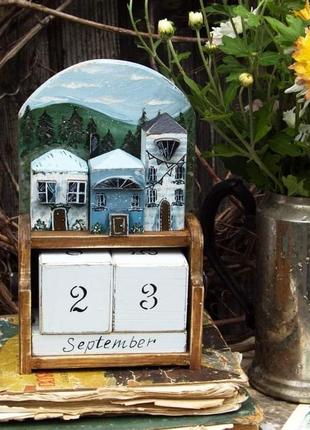 Вічний календар з будиночками в стриманому стилі