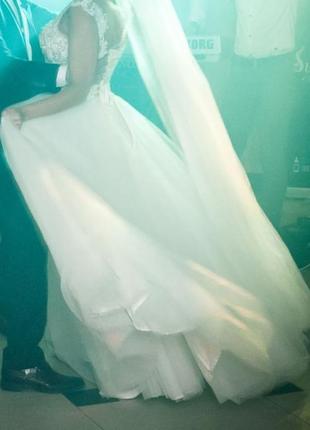 Весільна сукня з відчіпним шлейфом10 фото