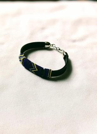 Кожаный браслет с желто-голубым бисерным плетением.4 фото