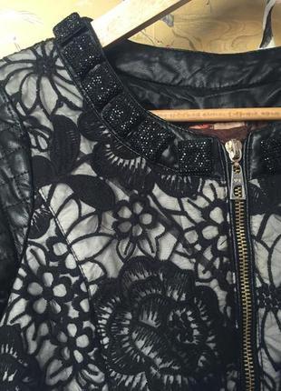 Ажурна куртка шкіряна