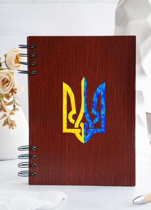 Книга для записів у дерев'яній обкладинці з гербом україни1 фото