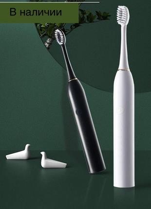 Електрична зубна щітка чорний та білий кллір