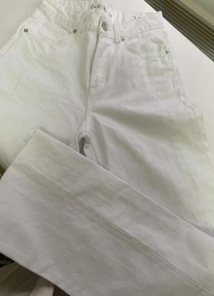 Білі кльові джинси 34 розміру1 фото