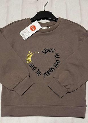 Симпатичная кофточка на девочку