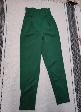 Зеленые брюки1 фото