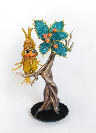 Желто-голубая композиция птичка на дереве